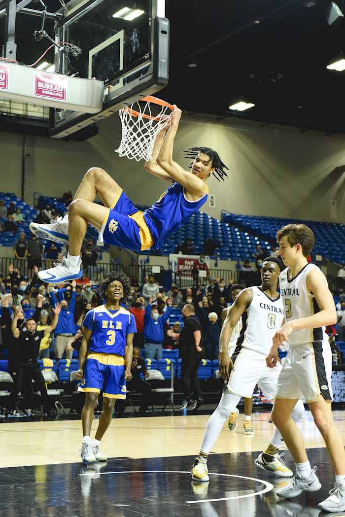 North Little Rock's Kel'el Ware dunks the ball against Little Rock Central.